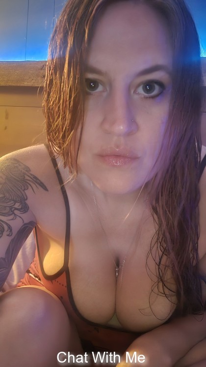 Hair wet and jammies on in bed waiting for you