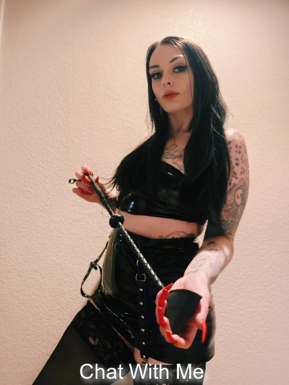 Dressed in leather and looking expensive The whip is just a warningwhether you behave is entirely up to you