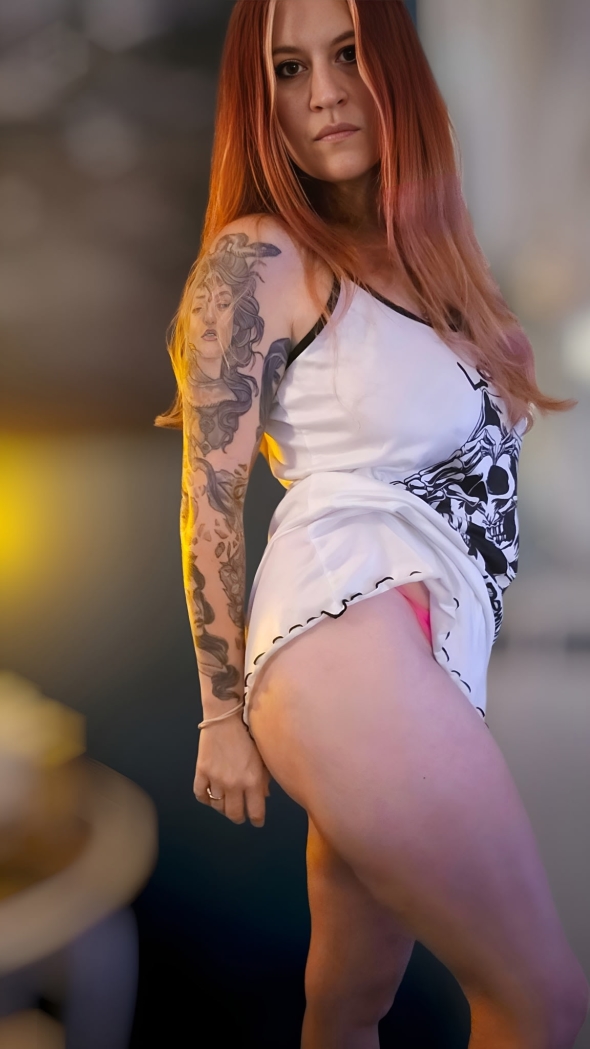 In my night gown showing some skin to tease you