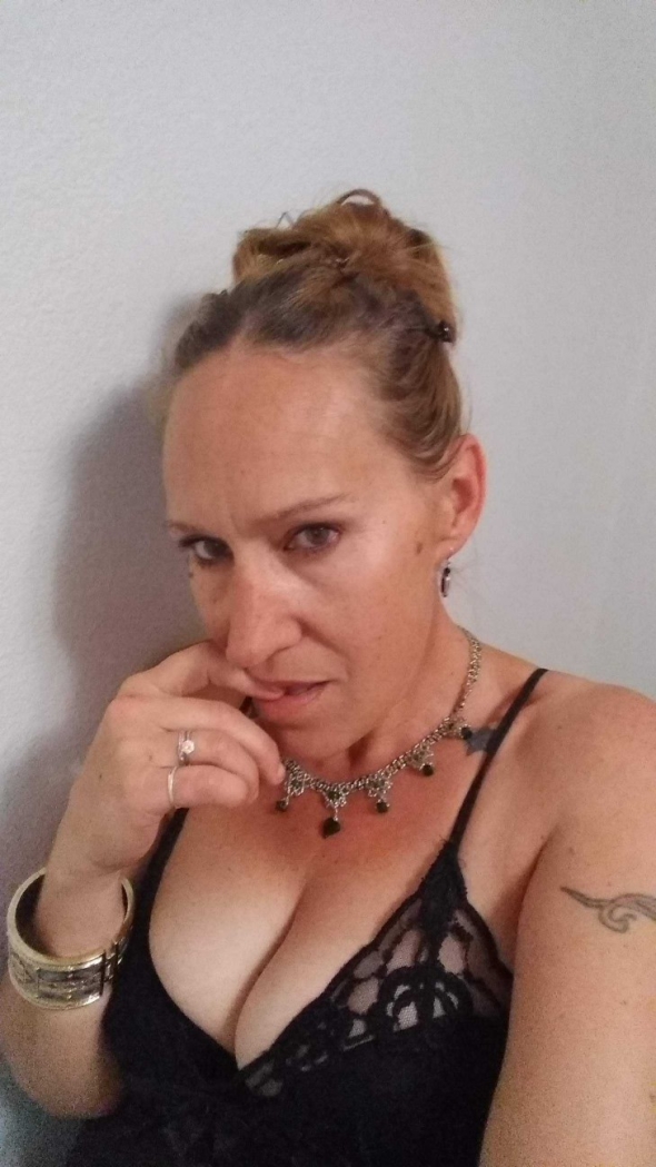 Sexy Milf is day dreaming thinking about talking to you