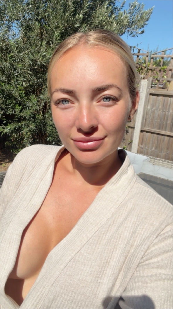 Making the most of the sunshine about to top up my tan