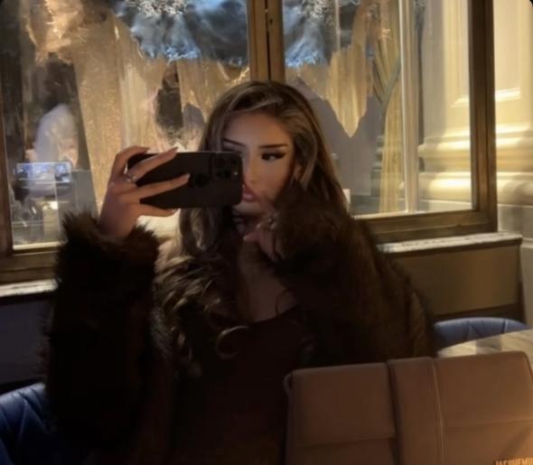 My hair flowing just right the dark lit room sparks something in me 