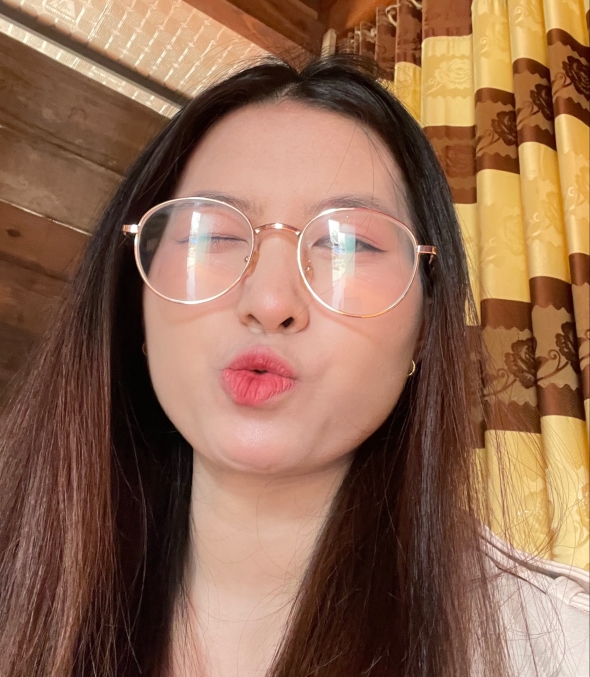Just a cute pout with a happy and bright mood 
