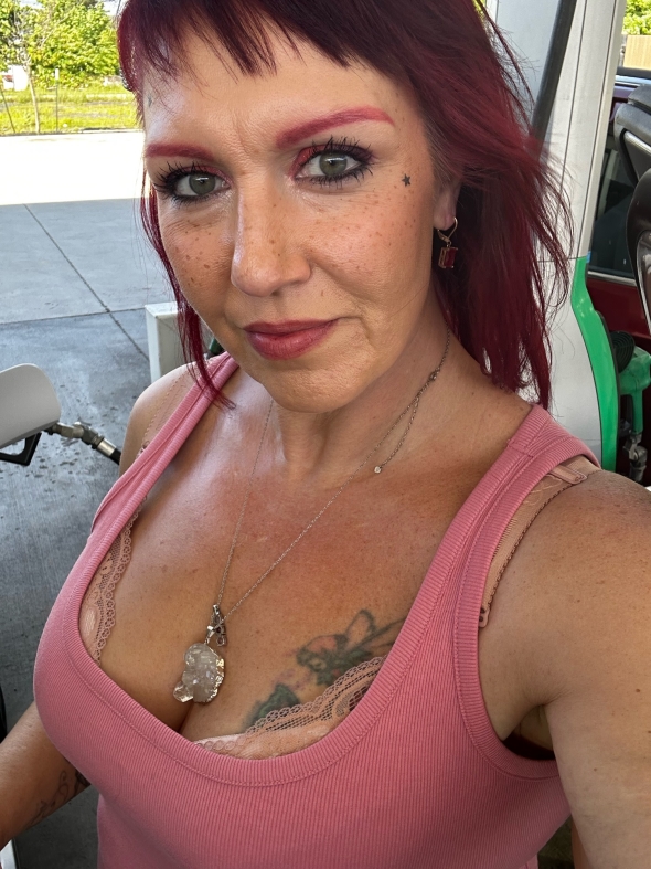 Getting gas and ready to start my day lookin cute in a tank. 